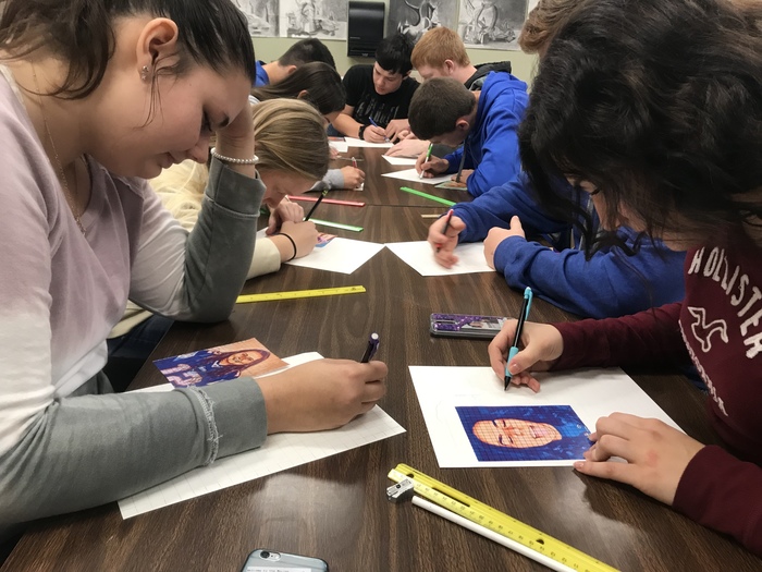 Painting class working on their self portraits! 